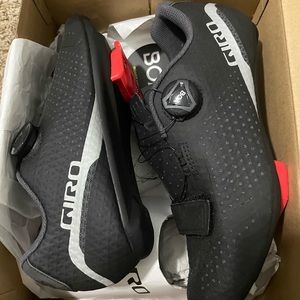 Giro cycling shoes. Worn one time. Still in the box and includes snap on clips.